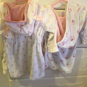 Carters Robes only used for vaca to put on outside of the pool. 0-9 months